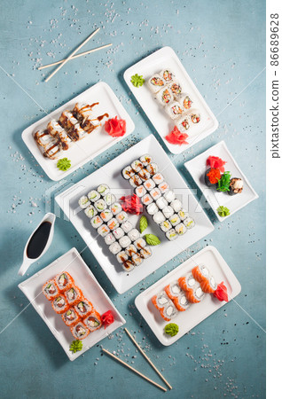 assorted sushi and rolls with soy sauce. Top view assorted sushi and rolls with soy sauce. Top view 86689628