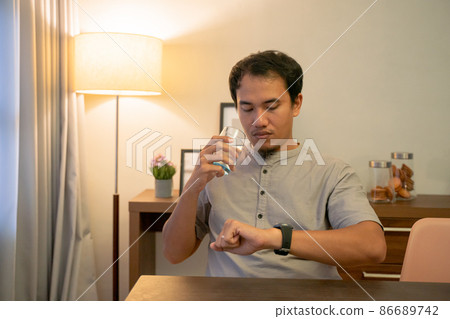 muslim male waiting to break his fasting muslim male waiting to break his fasting 86689742