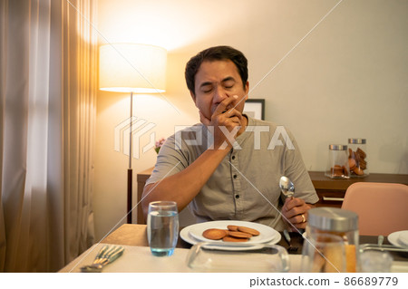 muslim couple having break fast or sahur in the morning muslim couple having break fast or sahur in the morning 86689779