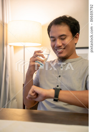 muslim male waiting to break his fasting muslim male waiting to break his fasting 86689792