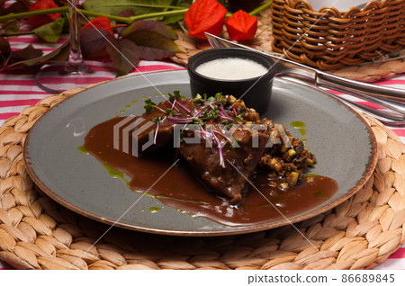 boiled beef with vegetables and sauce in the restaurant boiled beef with vegetables and sauce in the restaurant 86689845