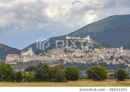 Panoramic view of Assisi old town, Province of Perugia, Umbria region, Italy 86691263