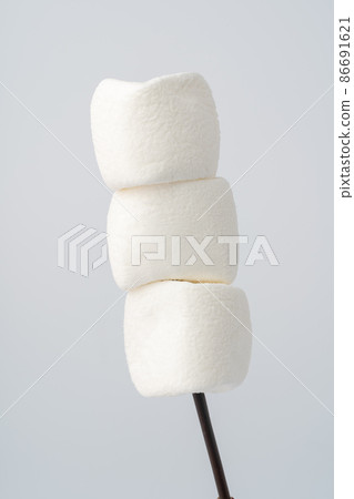 White marshmallows isolated on white background White marshmallows isolated on white background 86691621