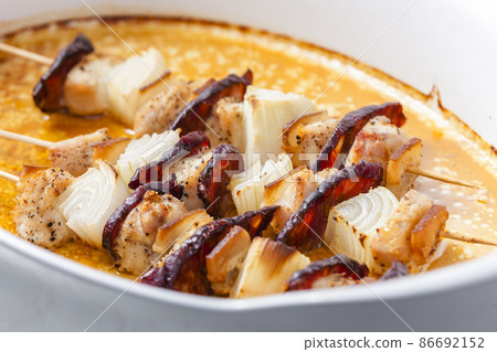 skewers with meat, bacon and onion skewers with meat, bacon and onion 86692152