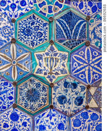 Mamluk era glazed ceramic tiles decorated with floral ornamentations Mamluk era glazed ceramic tiles decorated with floral ornamentations 86692688