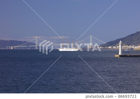 Akashi Kaikyo Bridge and sailing ship "Kaiwo Maru" 86693721