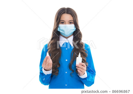 girl hold medicine nasal spray drug from running nose girl hold medicine nasal spray drug from running nose 86696867