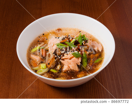 Shanghai soup with mussels and fish in a white bowl 86697772