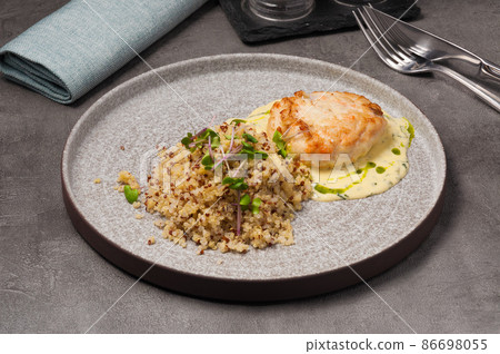 fish cutlet from pike perch and salmon with quinoa and Bernese sauce fish cutlet from pike perch and salmon with quinoa and Bernese sauce 86698055