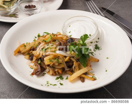 fried potatoes with onions and mushrooms with sour cream fried potatoes with onions and mushrooms with sour cream 86698086