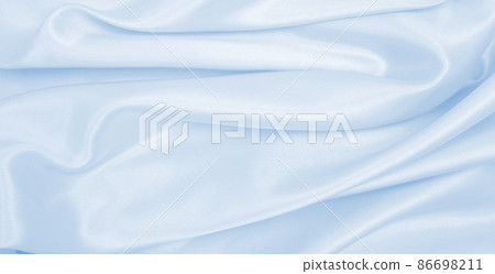 Smooth elegant blue silk or satin luxury cloth texture as abstract background. Luxurious background design Smooth elegant blue silk or satin luxury cloth texture as abstract background. Luxurious background design 86698211