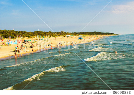 a lot of people on the beach. beach. Palanga. Baltic Sea a lot of people on the beach. beach. Palanga. Baltic Sea 86698888