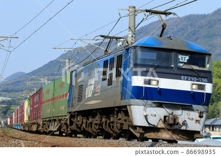 Freight train running on the Yosan Line (JR Freight EF210 type) 86698935