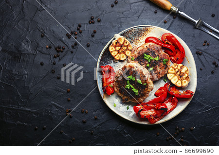 Beef steak in bacon with minced meat. Beef steak in bacon with minced meat. 86699690