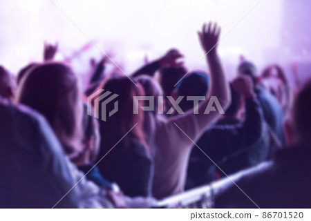 Blurred crowd of people at music festival 86701520