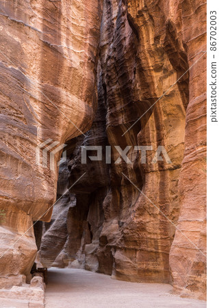 The Siq, a sandstone canyon in Petra, Jordan The Siq, a sandstone canyon in Petra, Jordan 86702003