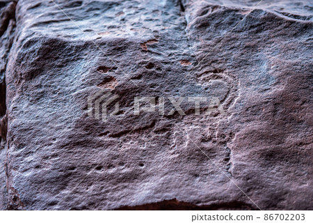Nabatean and Thamudic inscriptions on rock in Wadi Rum desert Nabatean and Thamudic inscriptions on rock in Wadi Rum desert 86702203