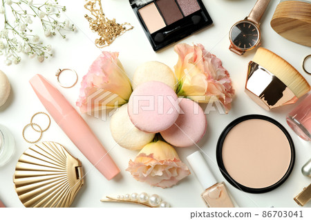 Female accessories and macaroons on white background Female accessories and macaroons on white background 86703041
