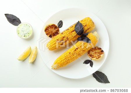 Concept of tasty food with grilled corn Concept of tasty food with grilled corn 86703088