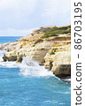 Ocean waves splash against beach with rocks background, Cliffs in the sea, Top aerial view of Cyprus, Nature Background with Sea, Vacation and relax 86703195
