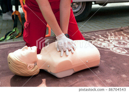 First aid training. Cardiopulmonary resuscitation - CPR procedure. 86704543