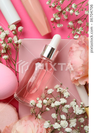 Female accessories and macaroons on pink background 86704706