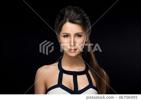 Brunette woman in stylish dress seductive looking Brunette woman in stylish dress seductive looking 86706995