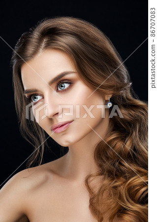Beautiful woman with make-up and hairstyle over 86707083