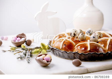 Homemade Easter traditional hot cross buns on ceramic dish 86708169