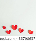 Composition with red paper hearts. Square background with copy space for Valentine's Day. 86708637