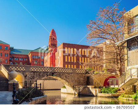 Sunny view of Riverwalk 86709507