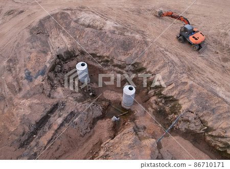 Laying of underground storm sewer pipes and sewerage wells.  86710171