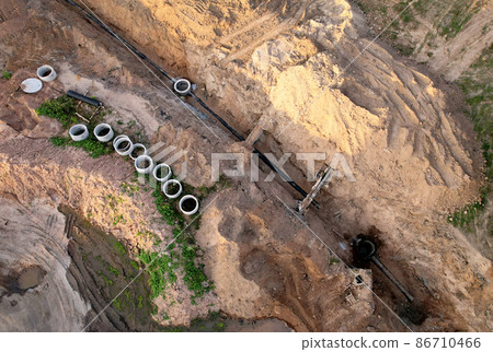 Laying of underground storm sewer pipes and sewerage well.  86710466