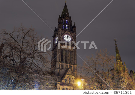 Manchester, UK night view of City Council iconic tower at midnight. Manchester, UK night view of City Council iconic tower at midnight. 86711591
