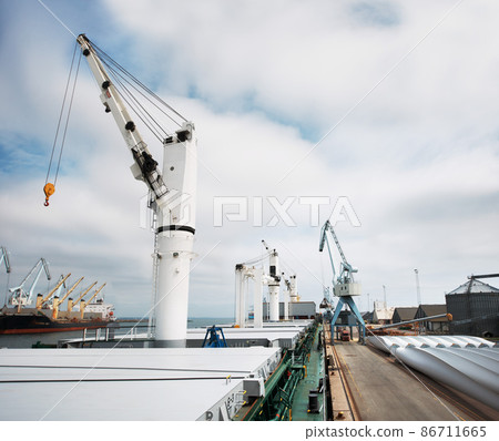 Tough work for tough machines. Cranes and industry in the harbor. 86711665