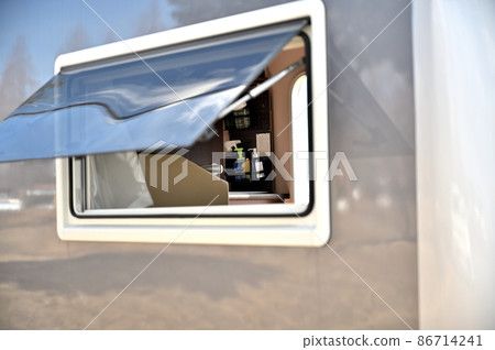 Outdoors with a camper Outdoors with a camper 86714241