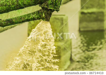 Emissions of radioactive dirty water from the pipeline pipe dangerous toxic chemical pollution of the environment Emissions of radioactive dirty water from the pipeline pipe dangerous toxic chemical pollution of the environment 86714410