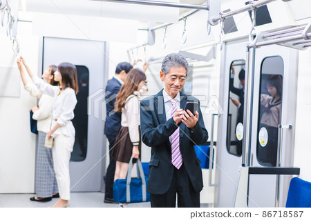Train conductor calling out to passengers who have fallen on the train Train conductor calling out to passengers who have fallen on the train 86718587