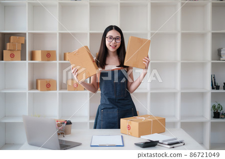 Asian small business owner working at home office. Business retail market and online sell marketing delivery, SME e-commerce concept. 86721049