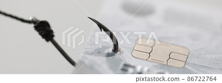 Bank plastic card hanging on fishing hook closeup Bank plastic card hanging on fishing hook closeup 86722764
