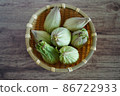 Japanese butterbur in a basket 86722933
