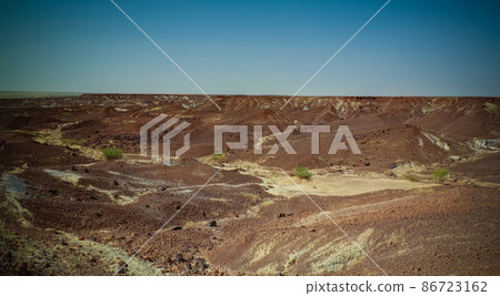 Rocky landscape at Sahara desert near Tchirozerine region, Agadez, Niger Rocky landscape at Sahara desert near Tchirozerine region, Agadez, Niger 86723162