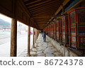 Tibetans in Kora at Labrang Monastery, Xiahe, Amdo, Tibet 86724378