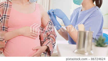 pregnant woman has inject vaccine pregnant woman has inject vaccine 86724624