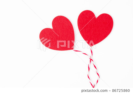 Red heart with rope isolated on white background. 86725860