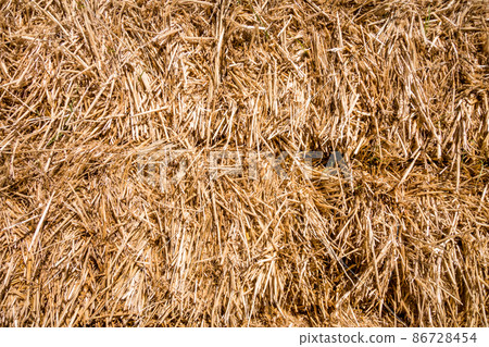 Bale of straw texture background Bale of straw texture background 86728454