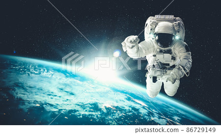 Astronaut spaceman do spacewalk while working for spaceflight mission 86729149