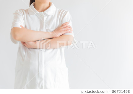 Working pregnant woman with arms crossed copy space Working pregnant woman with arms crossed copy space 86731498