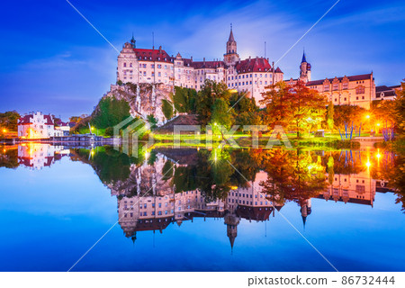 Sigmaringen, Germany - Colored sunset over Danube River, autumn landscape. 86732444