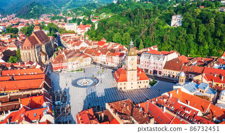 Brasov, Romania. Aerial view of historic city in Transylvania, Eastern Europe landmark. Brasov, Romania. Aerial view of historic city in Transylvania, Eastern Europe landmark. 86732451